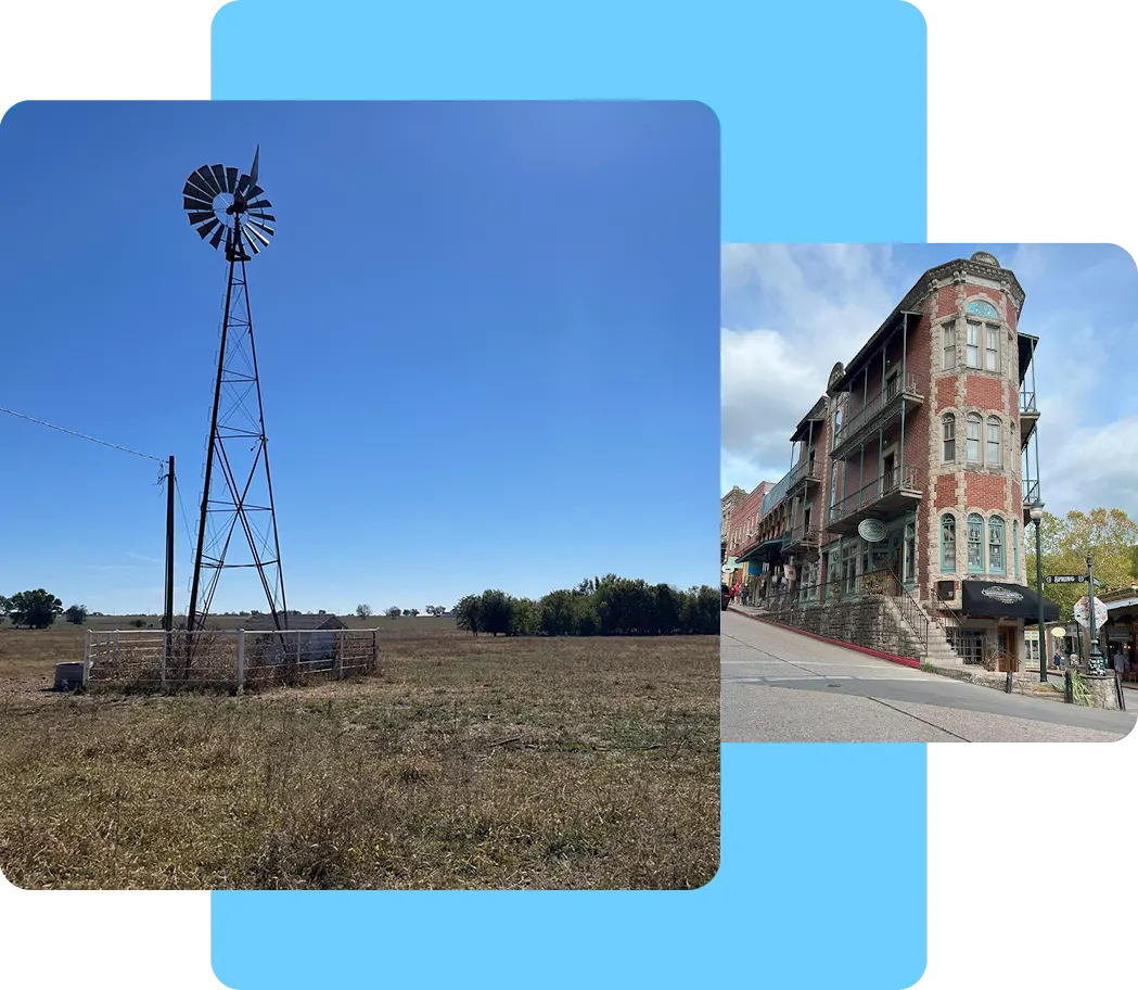 A windmill and some buildings in the background