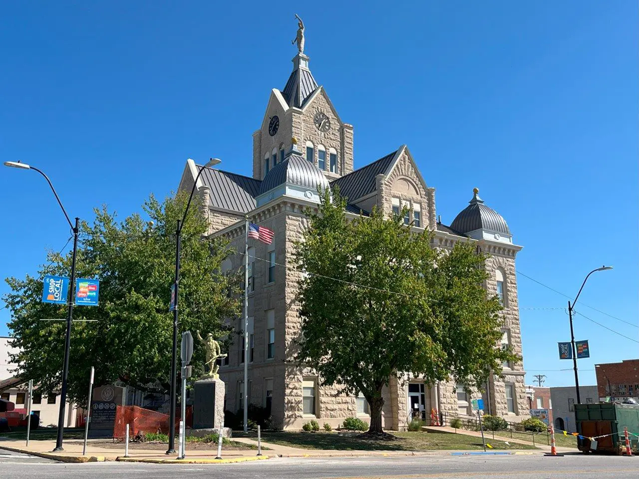 A large building with a clock tower on top of it.