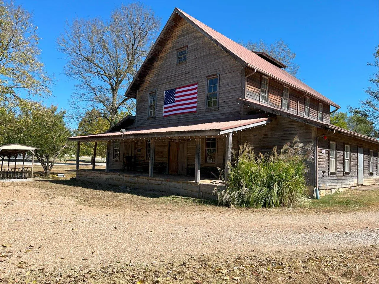 A house with an american flag on the front of it.